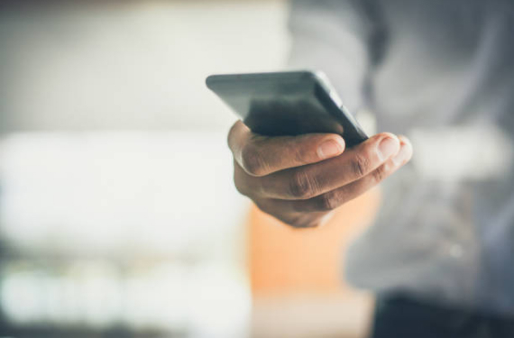 person holding mobile phone